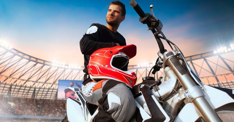 Imagem ilustrando o conteúdo sobre acessórios para motocross mostrando um competidor equipado com itens essenciais.